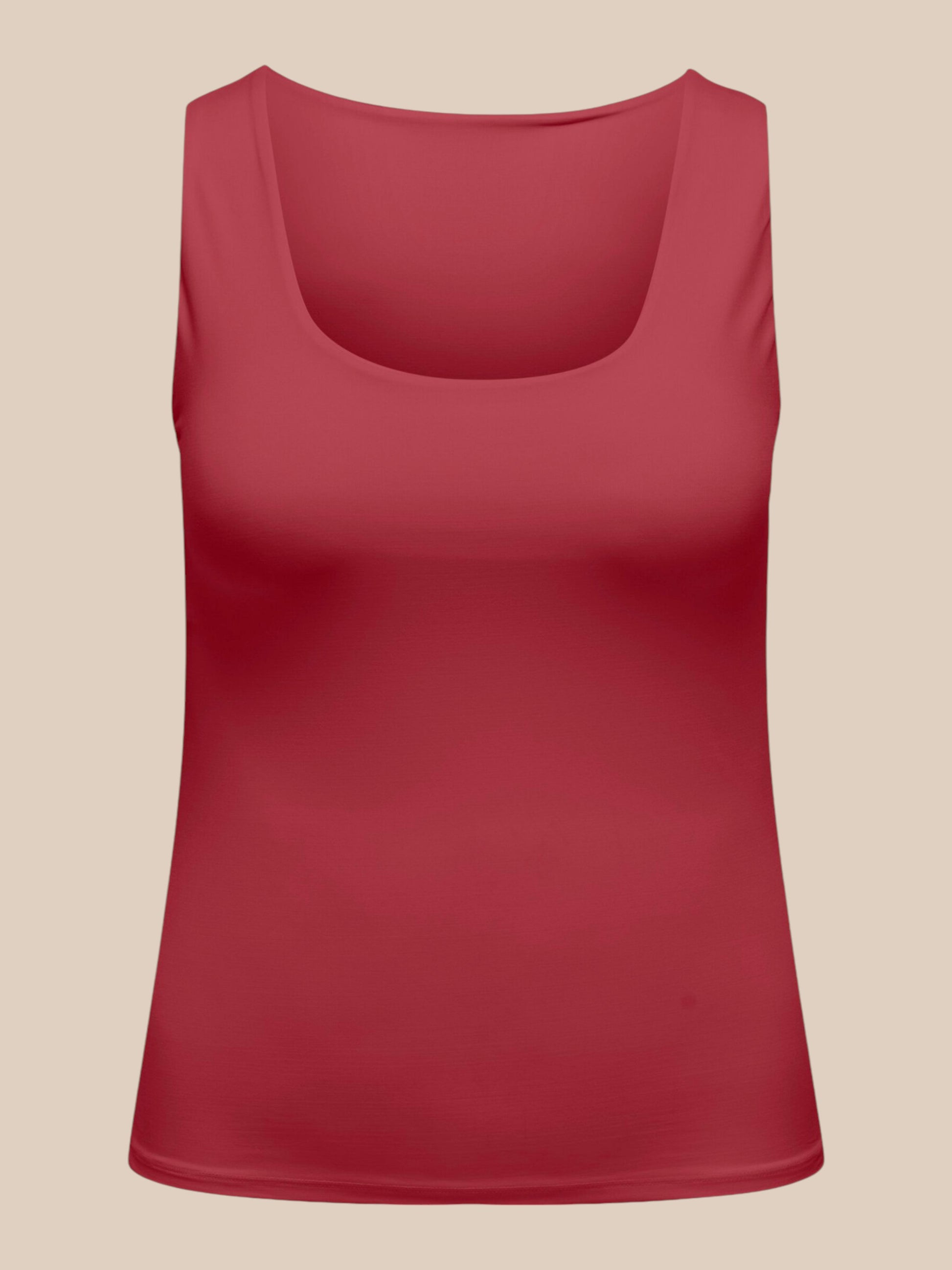 Smart vendbar plus size top i flot farve.