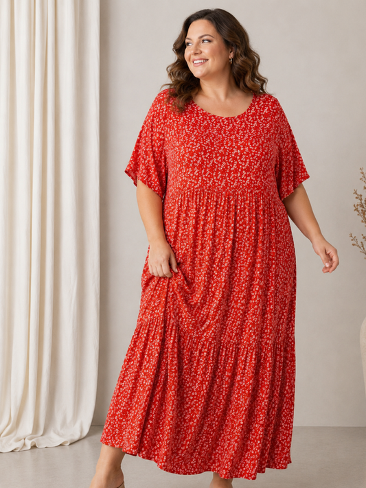 Denne smukke kjole er samme gode facon som vores Lolli kjole. Denne model er bare med blomster-print i stedet. 

Billedet er AI-genereret for at vise kjolen på et menneske.