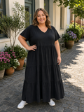 Bomuldskjolen til plus size kvinden som elsker maxi-kjoler. Dette er en af de kjoler du vil komme til at elske å selv de varmeste dage. 

Billedet er genereret vha. AI.