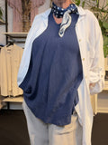En basis skjorte med en fantastisk pasform til plus size kvinden. Den er gennemknappet og kan bruges både åben og lukket.