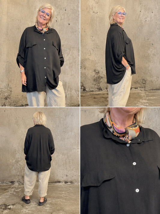 En basis skjorte med en fantastisk pasform til plus size kvinden. Den er gennemknappet og kan bruges både åben og lukket.