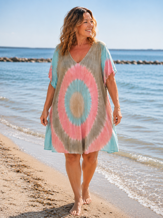 Lækker viskose kjole som går til lige over knæet på de fleste. Den er til plus size kvinden som elsker det lette og anderledes. 

Billedet er genereret vha. AI. 