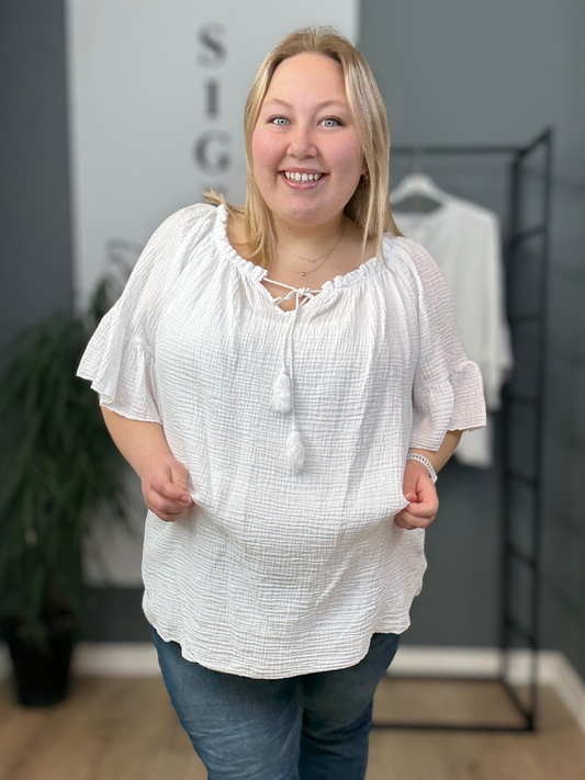 Ella plus size tunika i marine ble-kvalitet. Dejlig plussize bluse fra sigensgaard.dk