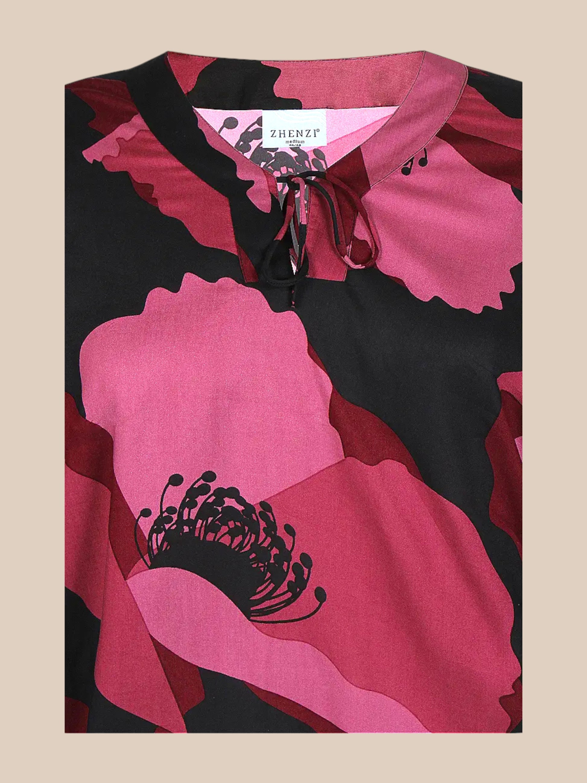 Plussize bluse fra Zhenzi som er det  mærke med de gode faconer, i bordeaux og brun flot print og flotte farver hverag eller fest den kan begge dele.