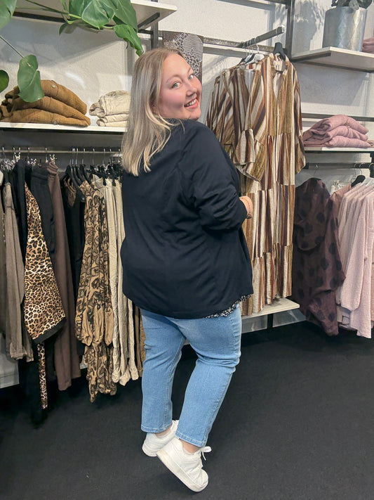 Smart sæt set bagfra. Det er til plus pigen som gerne vil se smart ud til hverdag. 