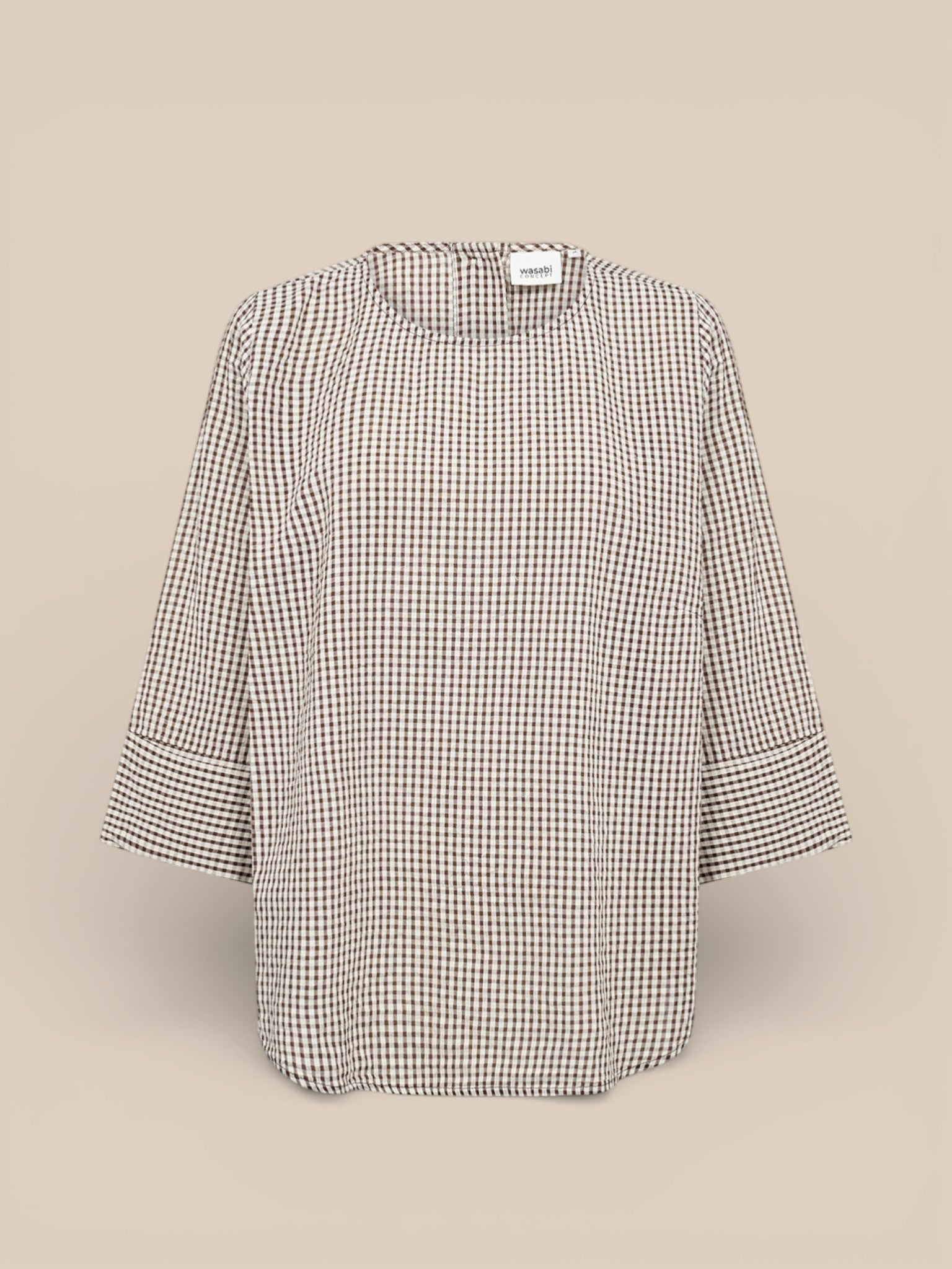 WA-SAINA 2 bluse i 100% økologisk bomuld med rund hals, udsatte ærmer og klassisk ternet print.