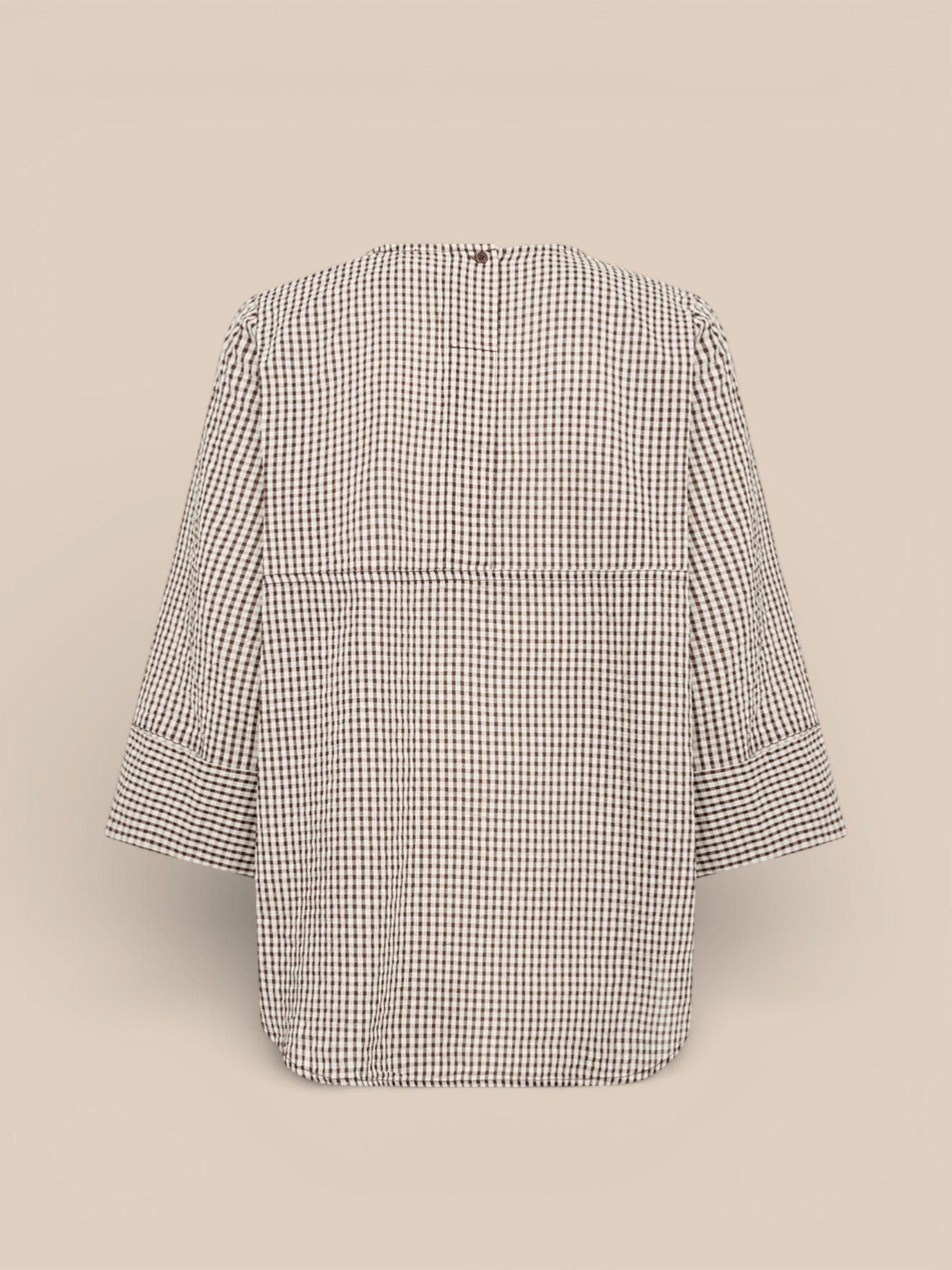 WA-SAINA 2 bluse i 100% økologisk bomuld med rund hals, udsatte ærmer og klassisk ternet print.