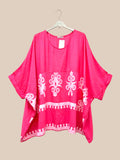 plussize tunika  med lommer og tryk mode til store piger. Her ses den i farven pink.